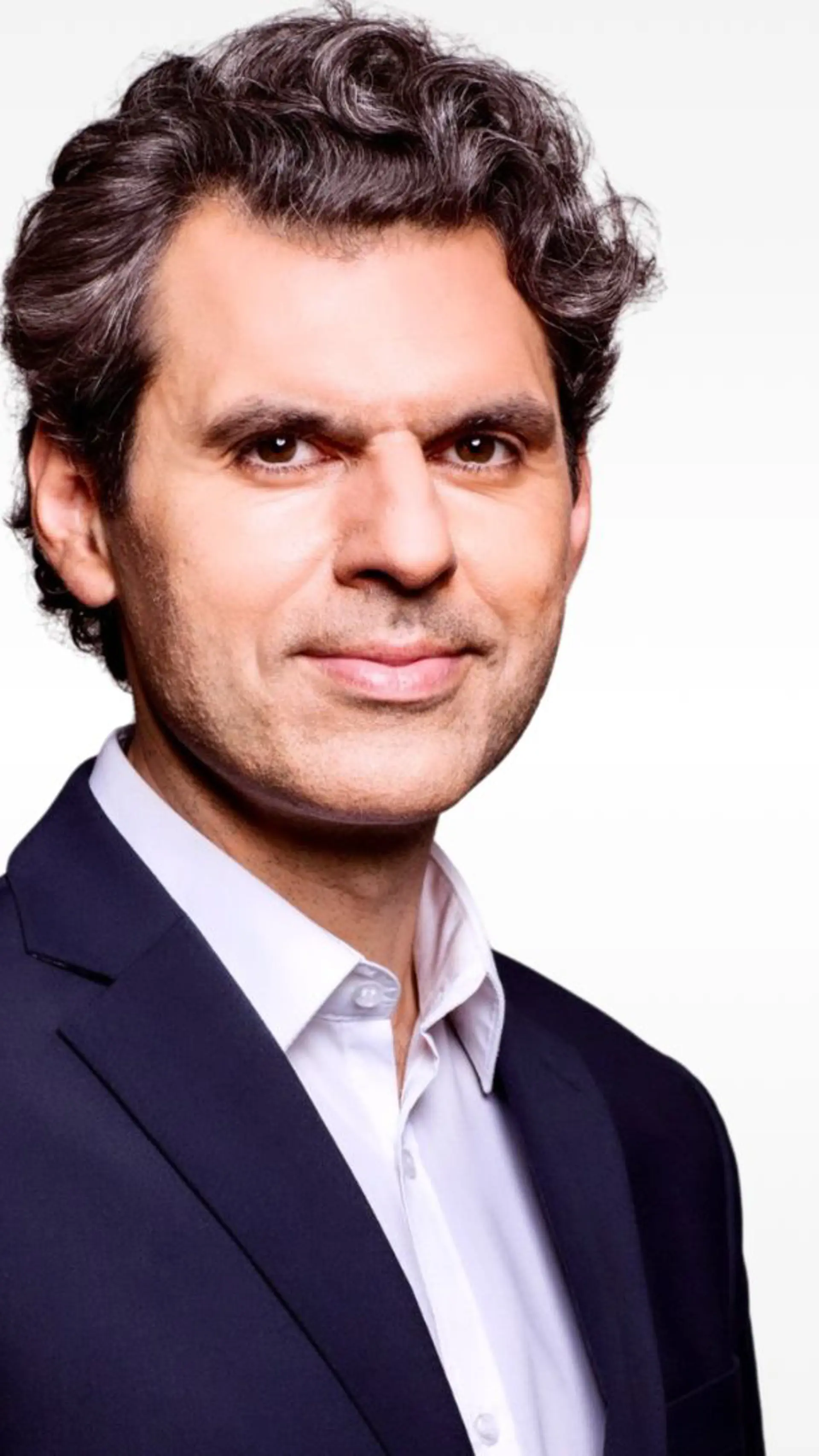 Ali Aslan - <p data-start="267" data-end="466">Ali Aslan is a globally recognized TV host and moderator, known for leading high-level discussions with world leaders and shaping global conversations.</p>