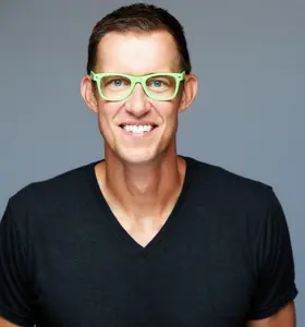 Erik Qualman - Erik Qualman inspires leaders to turn AI-driven change into opportunity with high-energy keynotes that spark action and lasting impact.